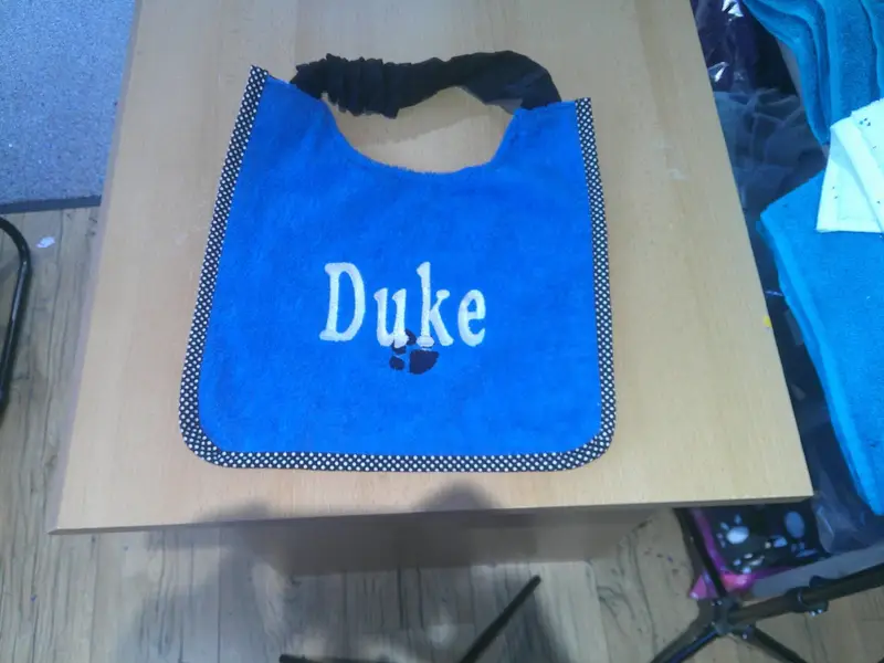 Dog bib brand new with name DUKE and paw: dscf0139
