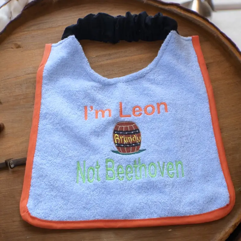 Personalised Saint Bernard dog bib with brandy barrel embroidered
