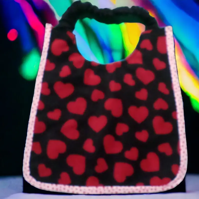 Black fleece bib with red hearts, photo 5