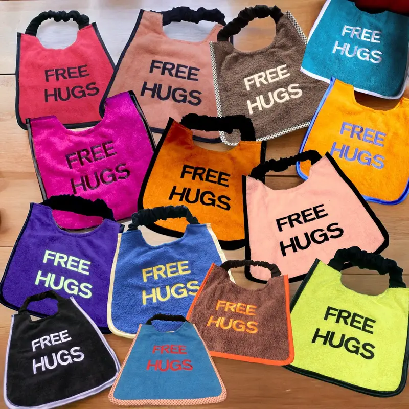 Dog bib with Free Hugs embroidered