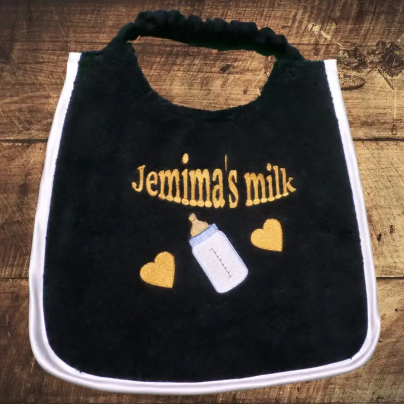 Milk bottle with dog’s name bib: jemima milk