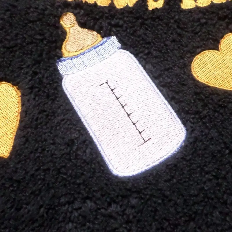 Milk bottle with dog’s name bib: jemima milk