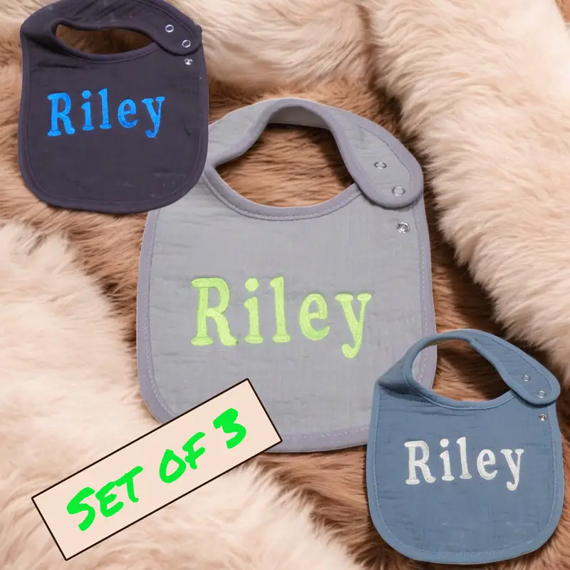 Close-up of a personalised embroidered baby bib showcasing durable stitching and vibrant colours.