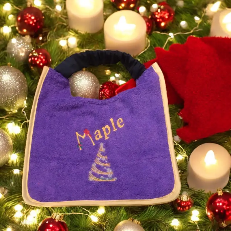 Christmas personalised dog slobber bib with swirly tree design, photo 7