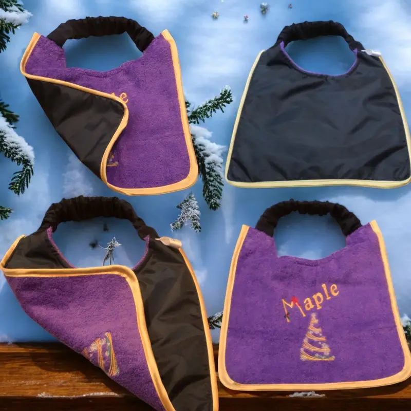 Christmas personalised dog slobber bib with swirly tree design, photo 5