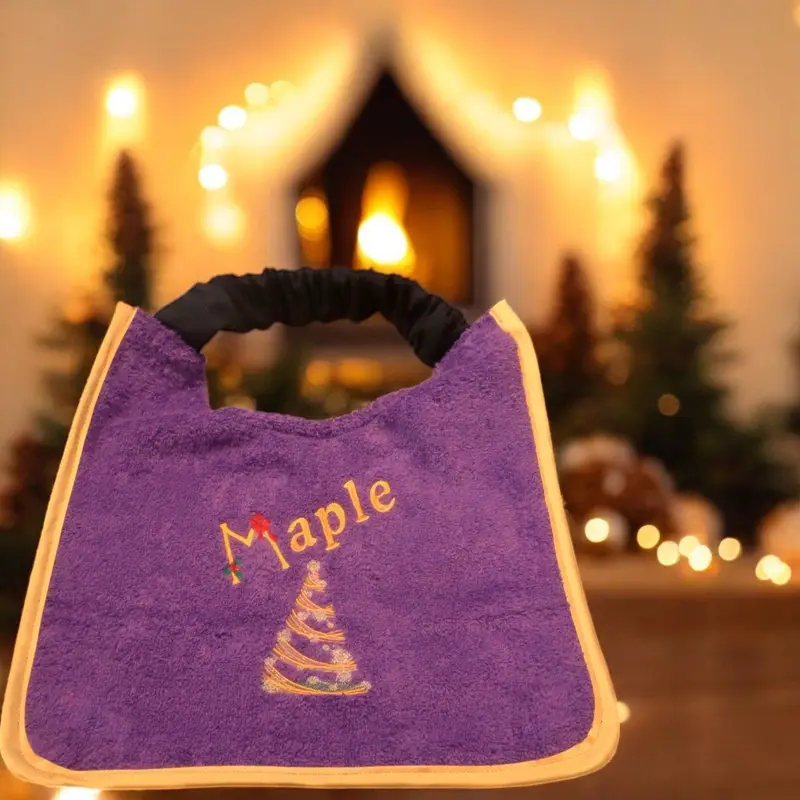 Christmas personalised dog slobber bib with swirly tree design, photo 3