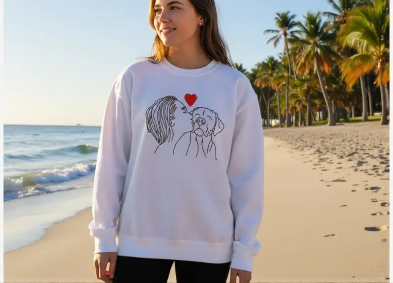 Embroidered Dog Lover Jumper: woman kissing dog