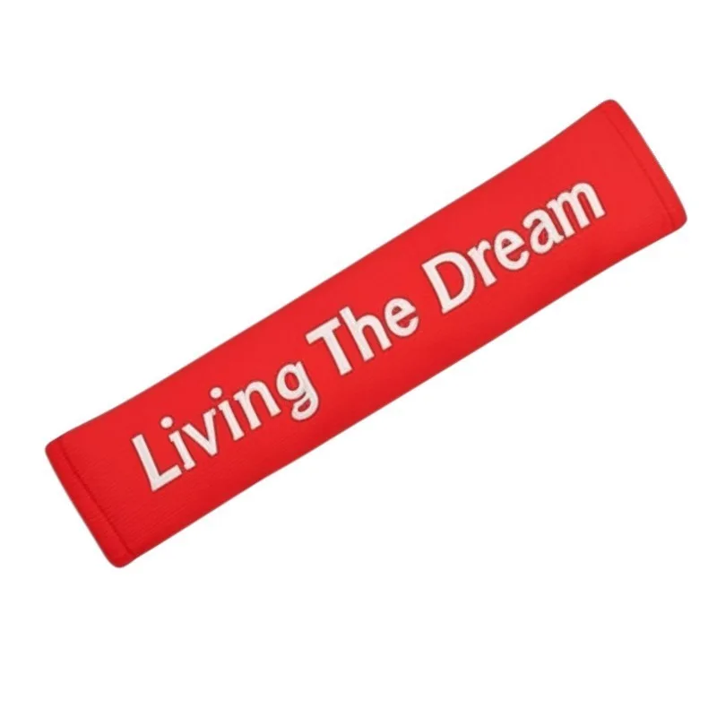 Seat belt cover embroidered with Living The Dream