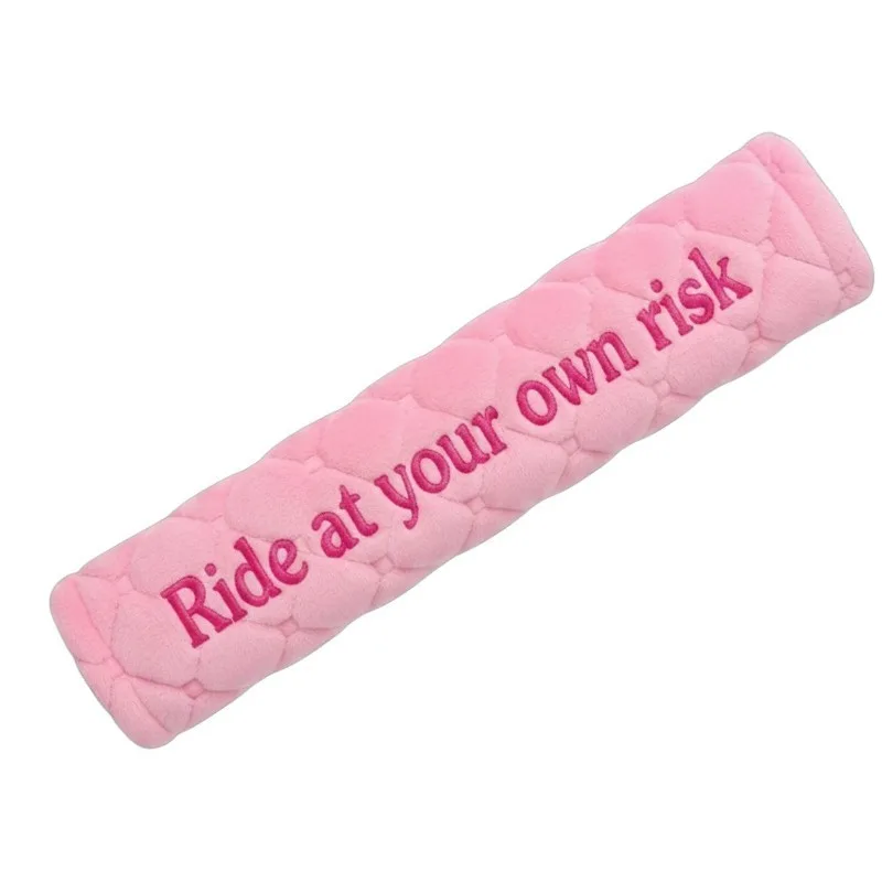 Seat belt cover embroidered with Ride At Your Own Risk