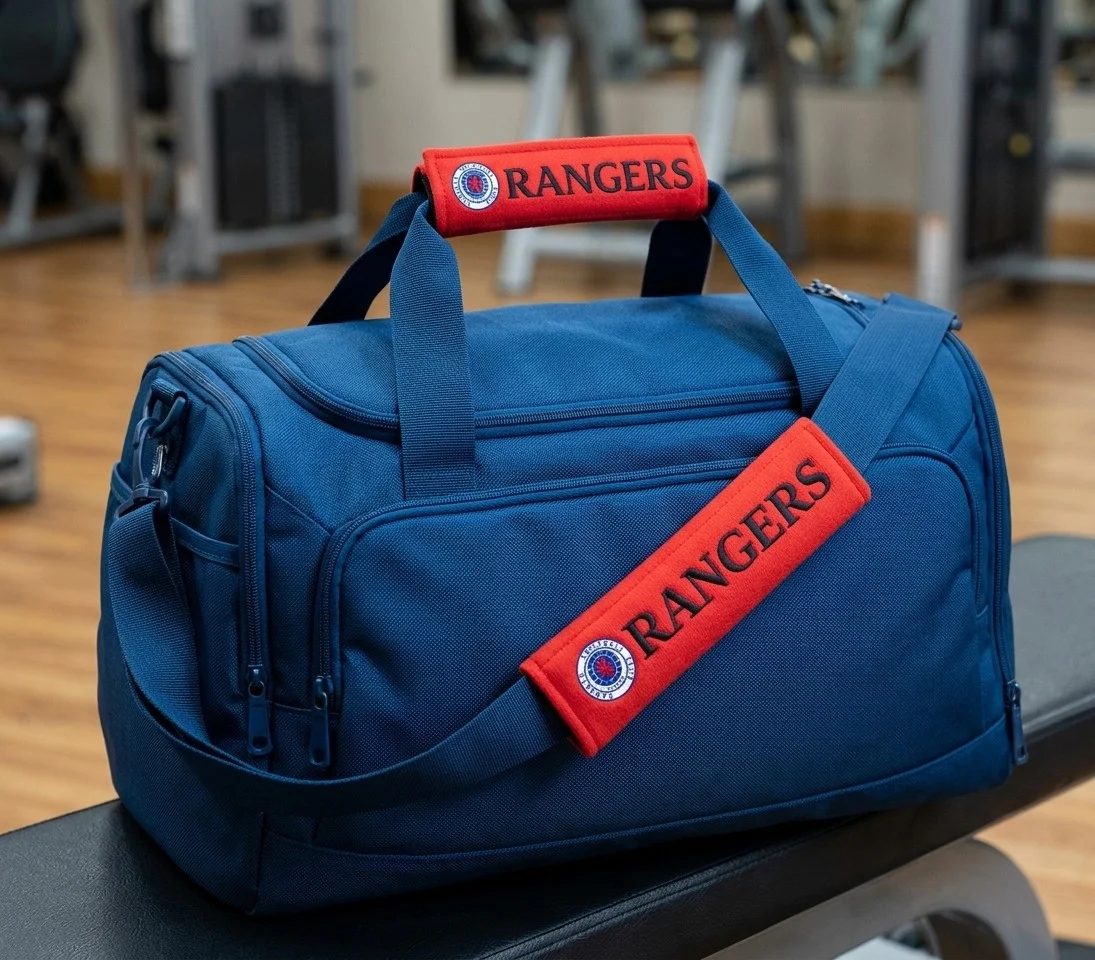Rangers seat belt covers on a sports bag handle and strap