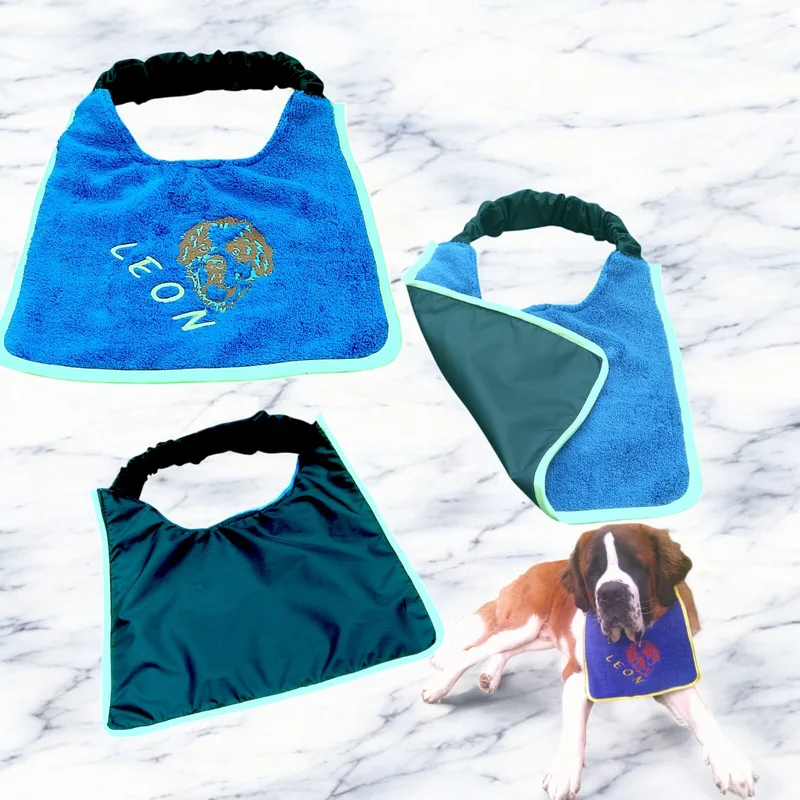 Saint Bernard head bibs laid flat, front and waterproof back