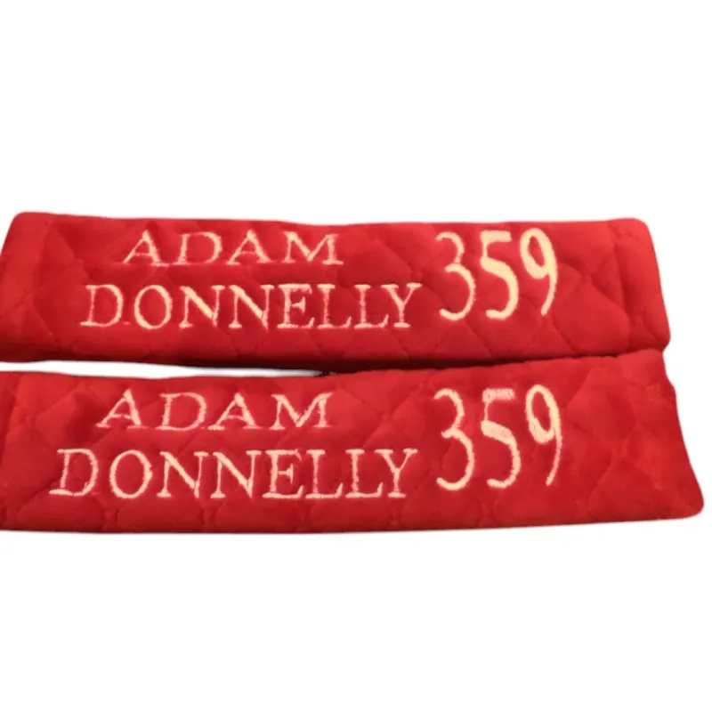 Seat belt covers embroidered with adam donnelly 359