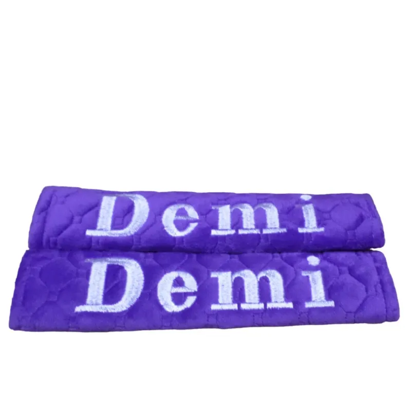 Seat belt covers embroidered with demi