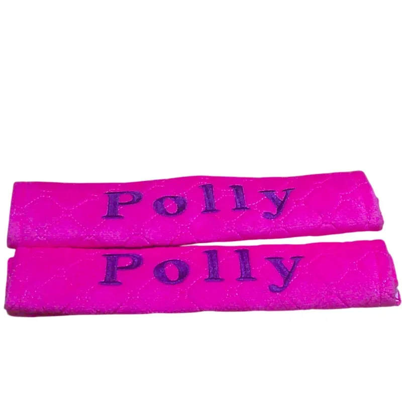 Seat belt covers embroidered with polly